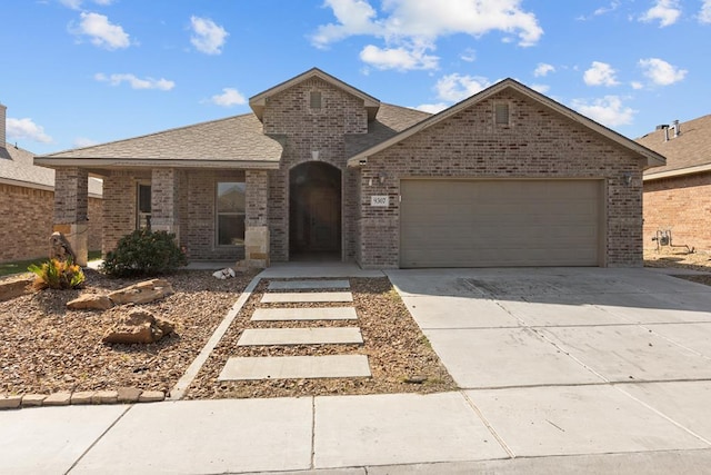 view of front of home with a garage