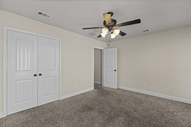 unfurnished bedroom featuring carpet flooring, ceiling fan, and a closet