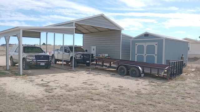 view of vehicle parking with a carport