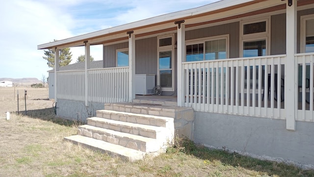 entrance to property with a porch