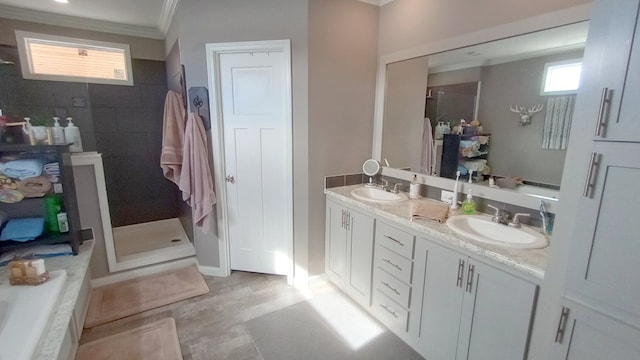 bathroom featuring vanity, walk in shower, and crown molding