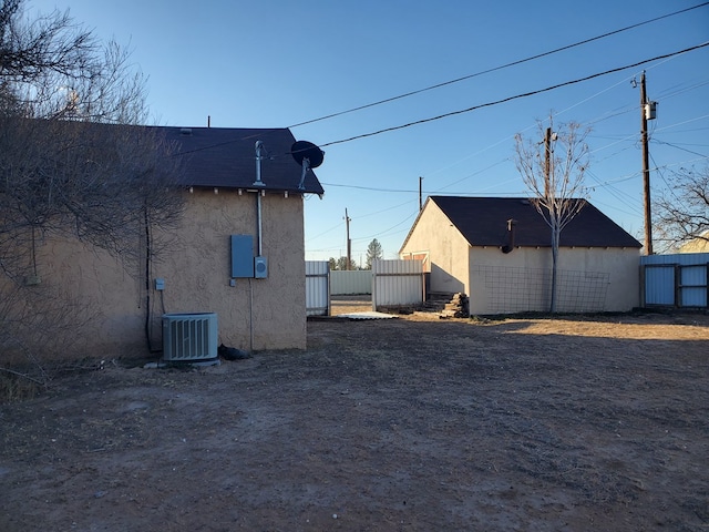 exterior space featuring central air condition unit