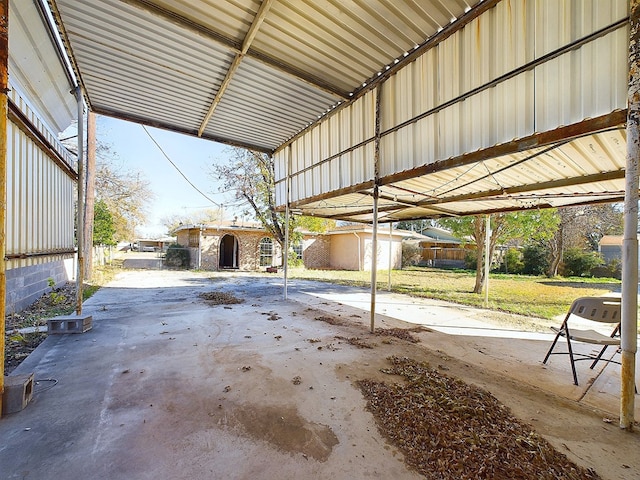 view of patio / terrace featuring a shed