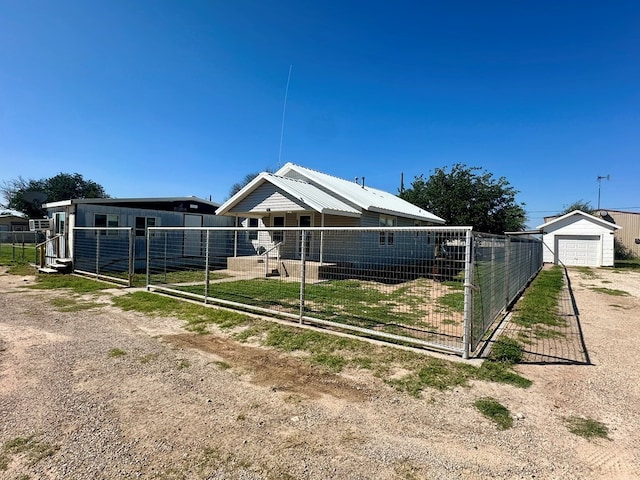 view of front of home with an outbuilding