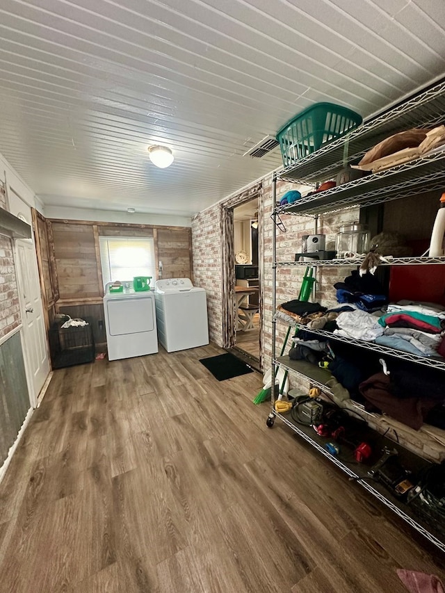 storage area featuring washing machine and dryer