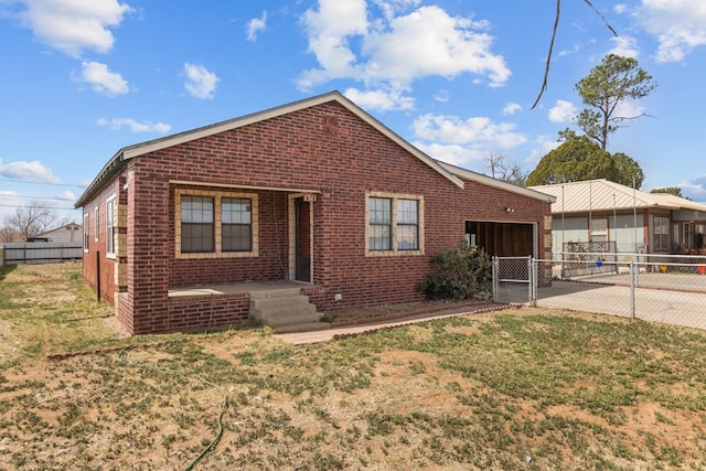 view of front of property featuring brick siding and fence