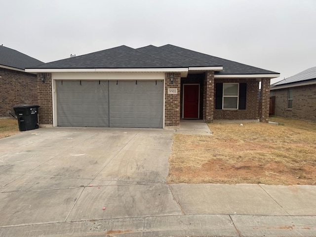 view of front of property with a garage