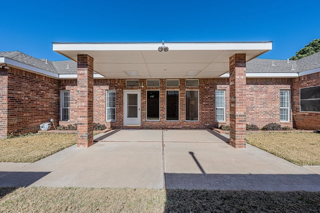 exterior space with a yard and a patio area