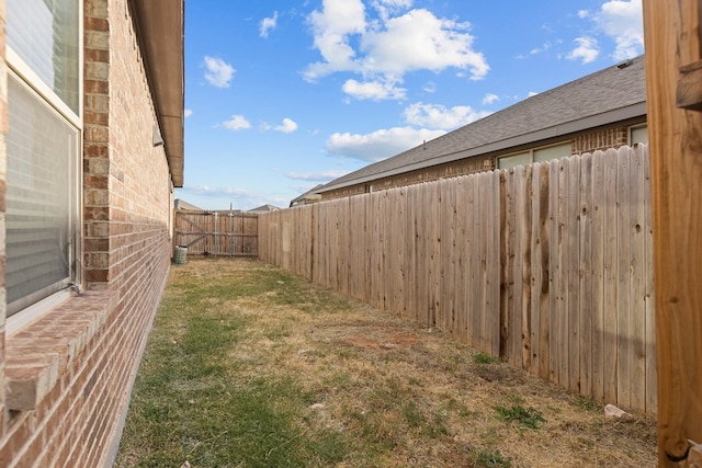 view of yard featuring a fenced backyard