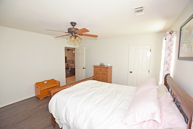 bedroom featuring dark wood-type flooring and ceiling fan