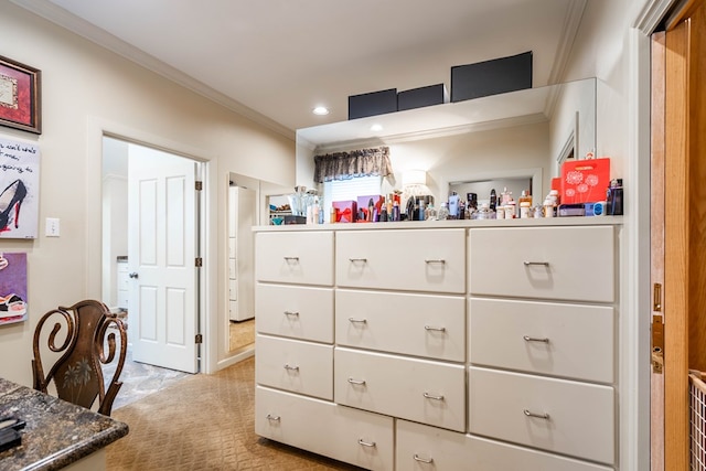 interior space featuring crown molding and light colored carpet