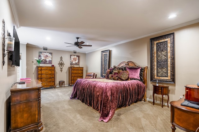 bedroom with ceiling fan, crown molding, and light carpet