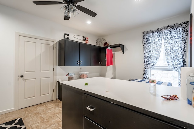 laundry area featuring ceiling fan