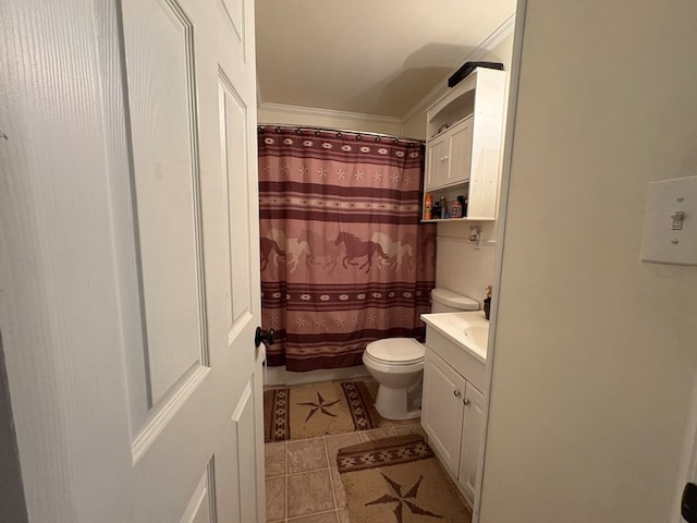 bathroom with vanity, curtained shower, toilet, and tile patterned flooring