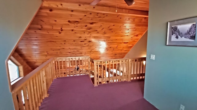 additional living space featuring carpet flooring, wood ceiling, and vaulted ceiling