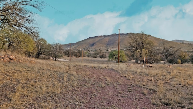 property view of mountains featuring a rural view