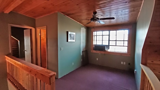 spare room featuring ceiling fan and wood ceiling