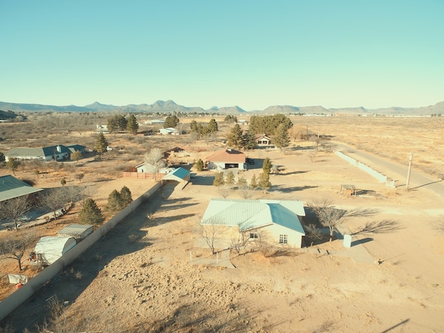 drone / aerial view featuring a mountain view