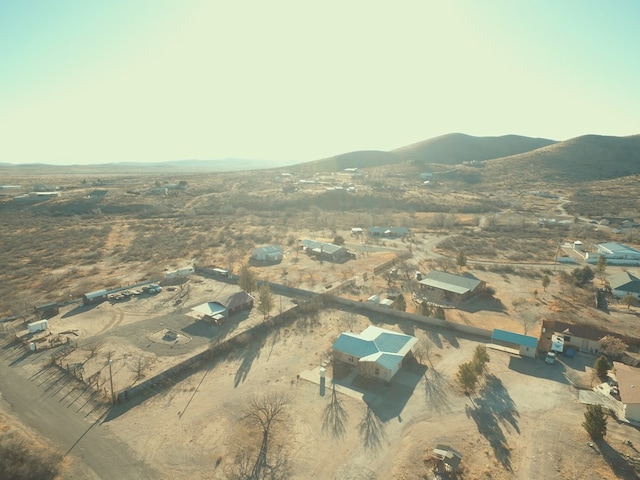 drone / aerial view featuring a rural view and a mountain view