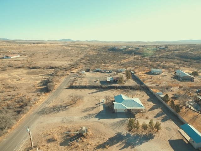 birds eye view of property featuring a rural view