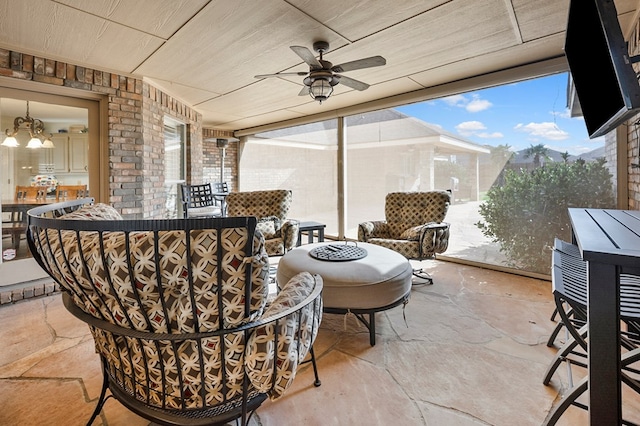 view of patio featuring a ceiling fan and outdoor dining area