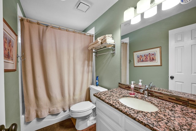 full bathroom featuring toilet, shower / bathtub combination with curtain, visible vents, and vanity