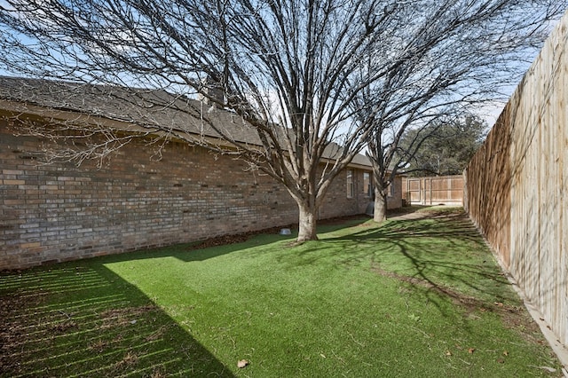 view of yard featuring fence