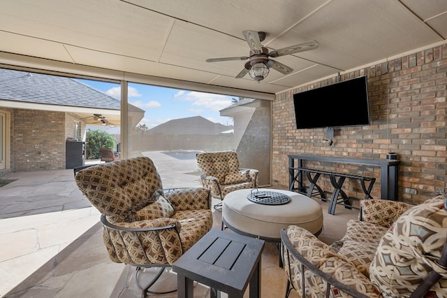 view of patio featuring ceiling fan