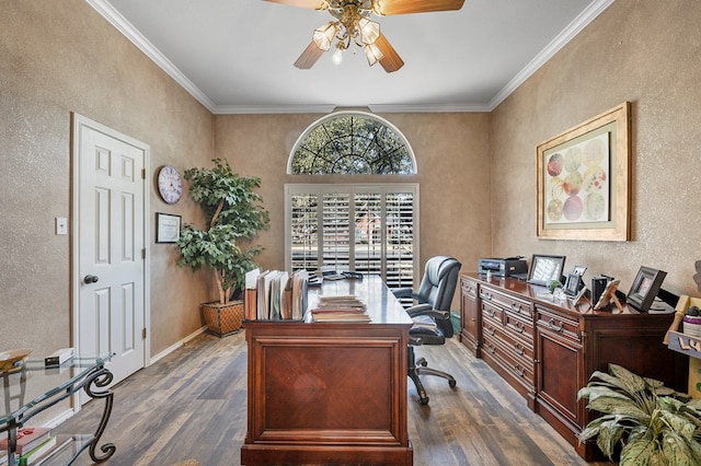 office space featuring dark wood-style floors, crown molding, and ceiling fan