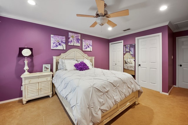 bedroom featuring recessed lighting, light colored carpet, visible vents, ornamental molding, and baseboards