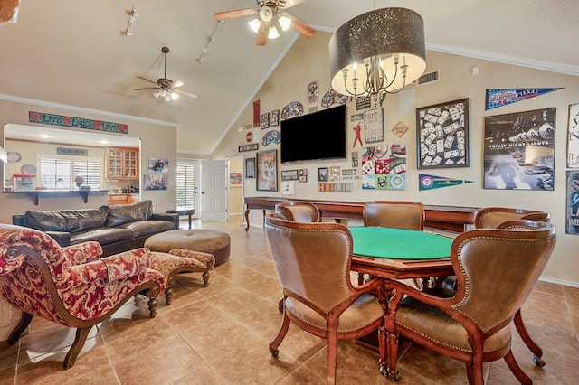 interior space with visible vents, ornamental molding, rail lighting, vaulted ceiling, and ceiling fan with notable chandelier