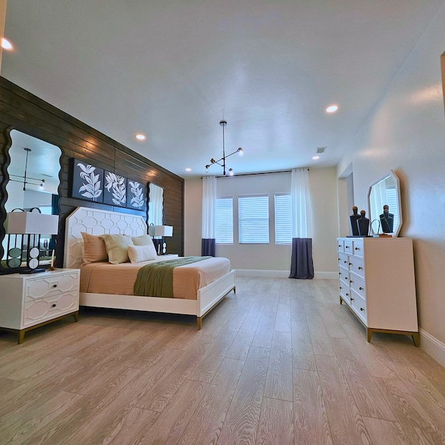 bedroom featuring recessed lighting, visible vents, baseboards, and wood finished floors