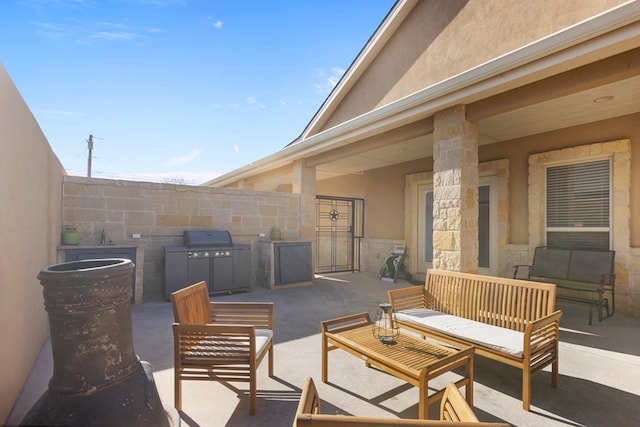 view of patio / terrace featuring an outdoor living space and area for grilling