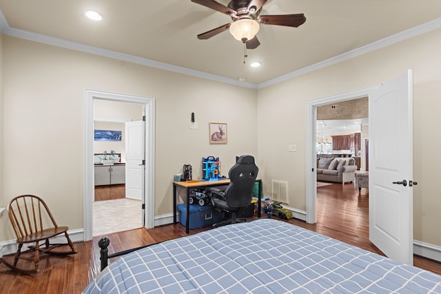 bedroom with hardwood / wood-style flooring, ceiling fan, and ornamental molding