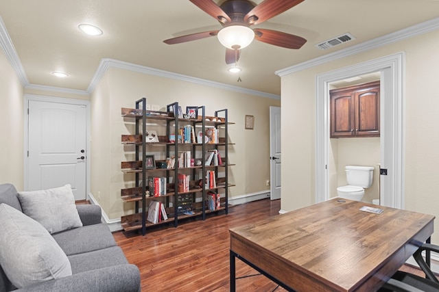 office area featuring ceiling fan, ornamental molding, and dark wood-type flooring