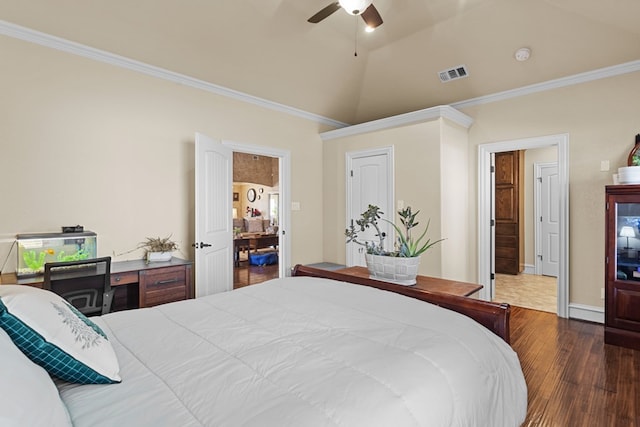 bedroom with dark wood-type flooring, crown molding, ceiling fan, and lofted ceiling