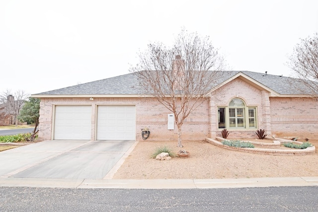 ranch-style home featuring a garage