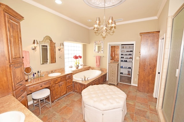 bathroom featuring vanity, a notable chandelier, crown molding, and a bathtub