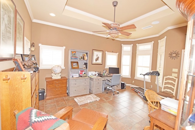 office with a tray ceiling, ornamental molding, and ceiling fan