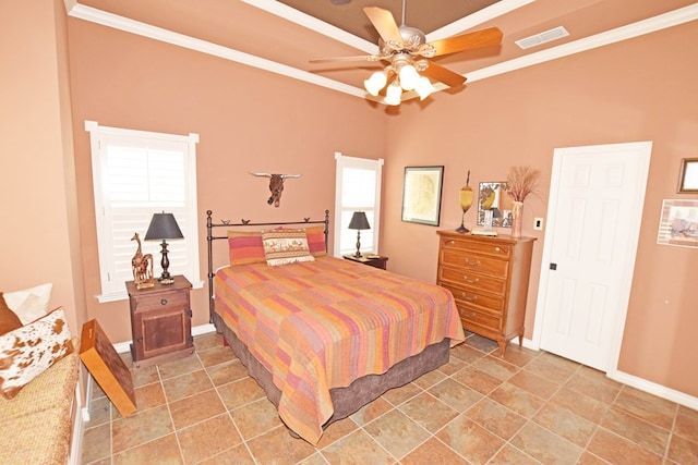 bedroom featuring ornamental molding and ceiling fan