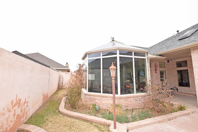 exterior space with a sunroom