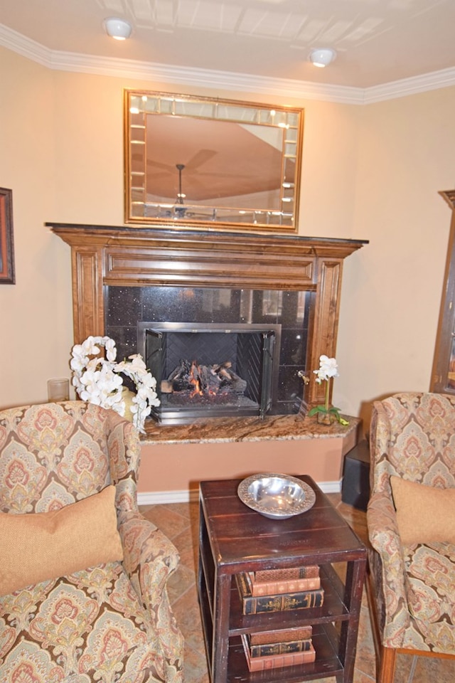 living room with crown molding and a high end fireplace