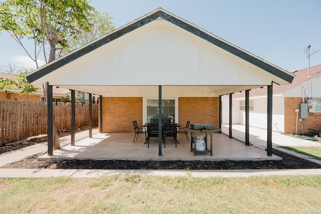 back of property with a patio area