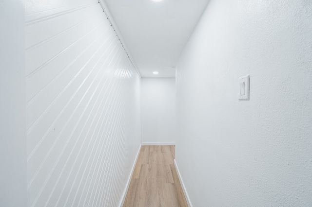 hallway with light wood-type flooring