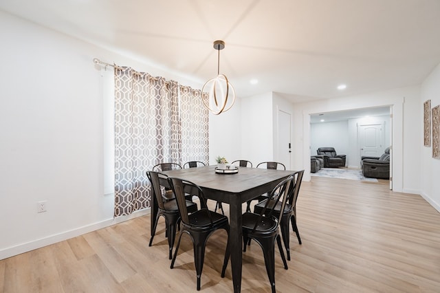 dining area with light hardwood / wood-style flooring