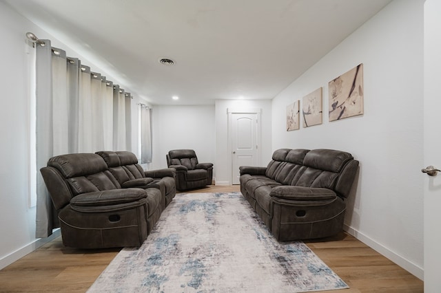 living room featuring light wood-type flooring