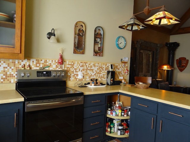 kitchen with backsplash, blue cabinets, hanging light fixtures, and electric stove