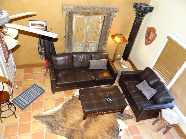 living room with tile patterned floors