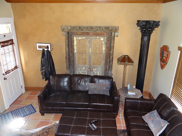 living room with tile patterned flooring