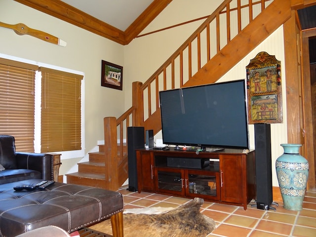 tiled living room with crown molding and lofted ceiling